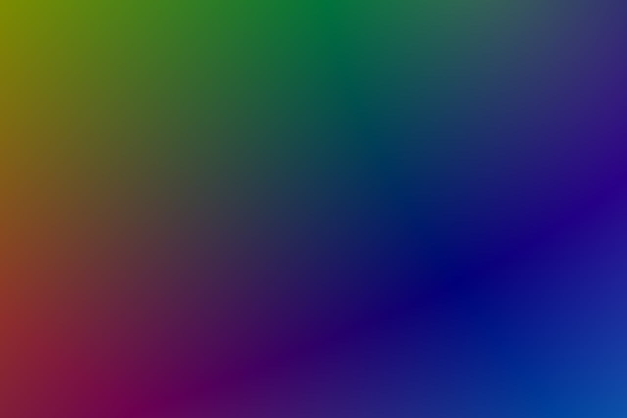 A vivid and colorful gradient background featuring blue, green, and purple hues.
